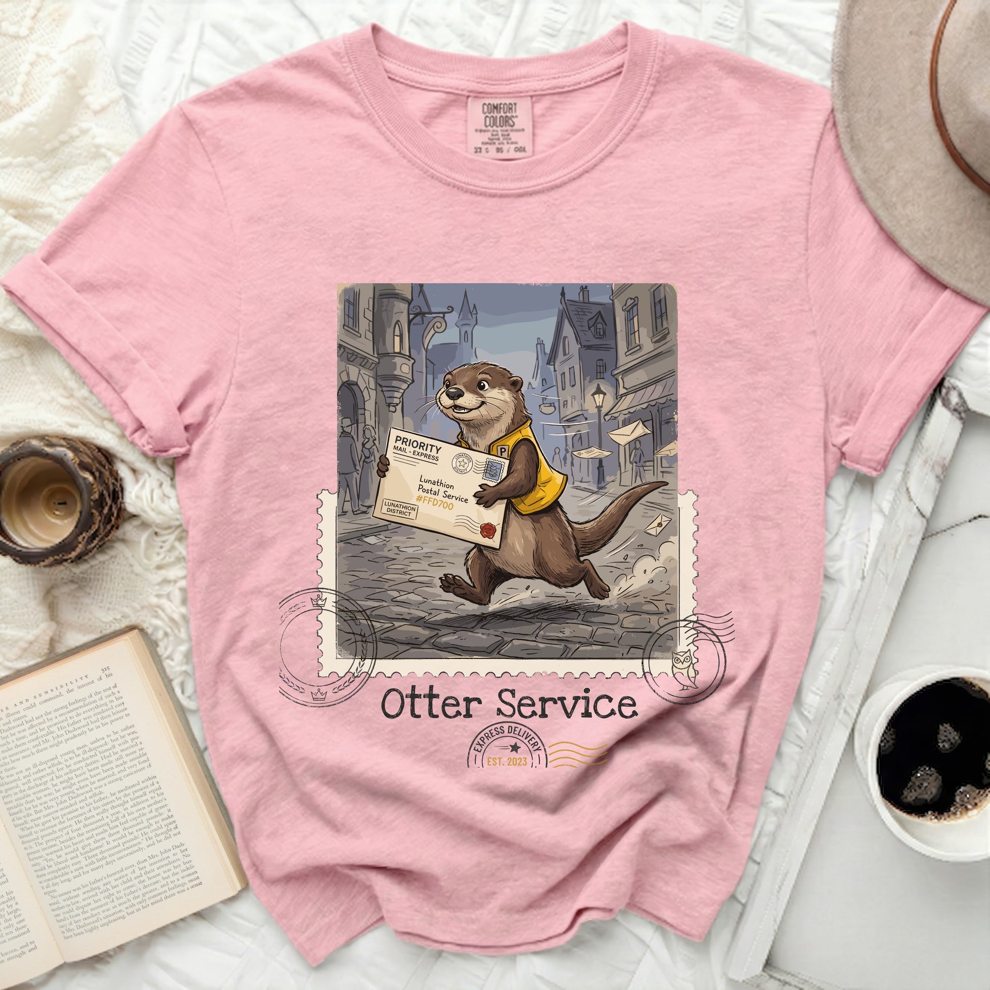 T-shirt with a cartoon otter delivering mail for "Otter Service".