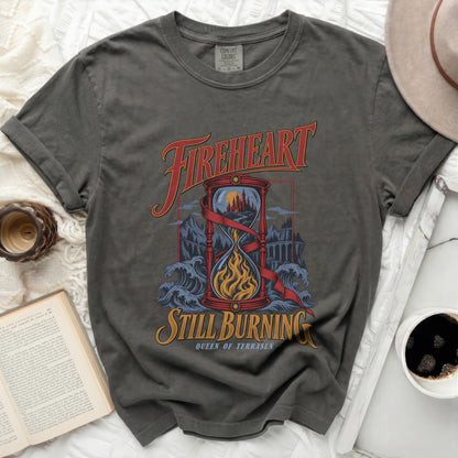 Dark grey t-shirt with "FIREHEART" and "STILL BURNING QUEEN OF TERRASEN" text.