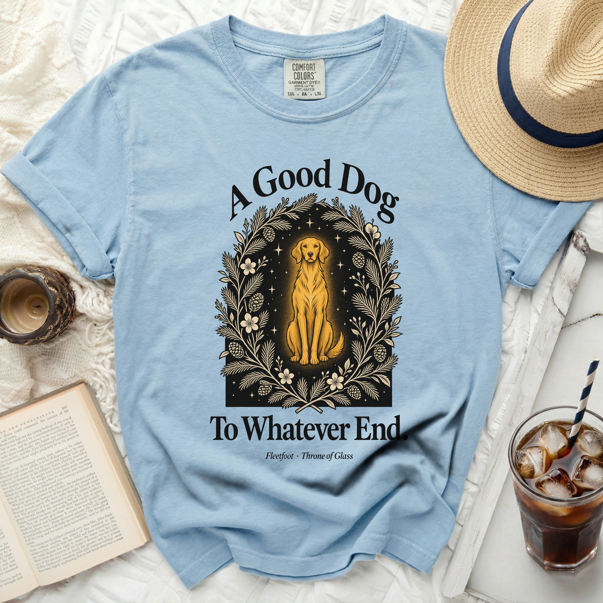 Light blue t-shirt with "A Good Dog To Whatever End" graphic and dog illustration.