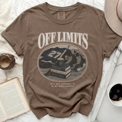 Brown t-shirt with "OFF LIMITS" text and hockey graphics over books.