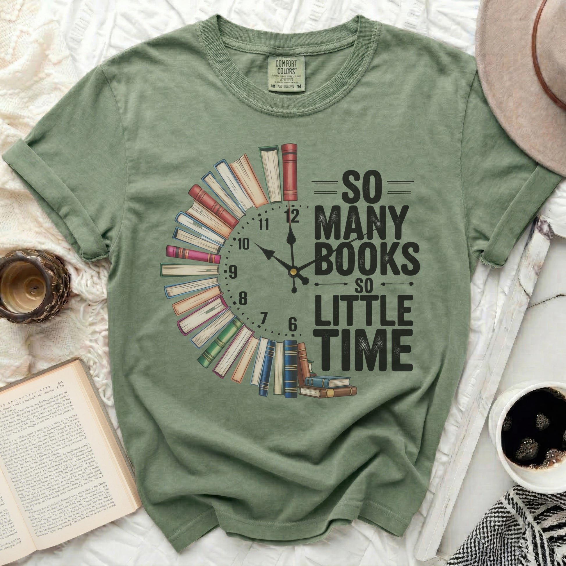 Green t-shirt with "So Many Books So Little Time" text and book clock design.