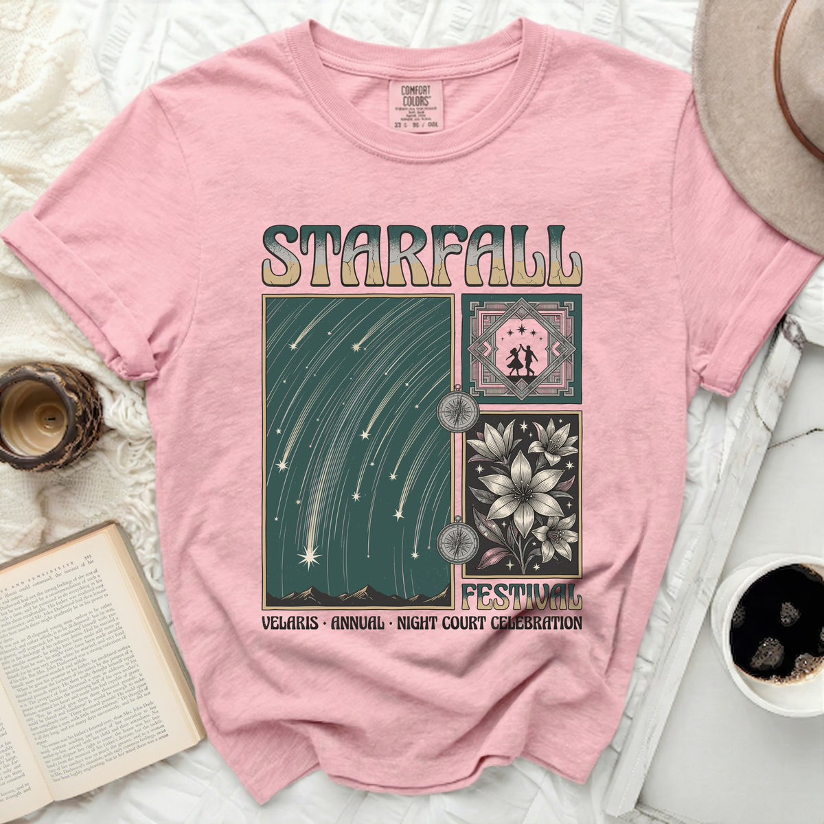 Pink t-shirt with "Starfall Festival" graphic of celestial scenes and flowers.