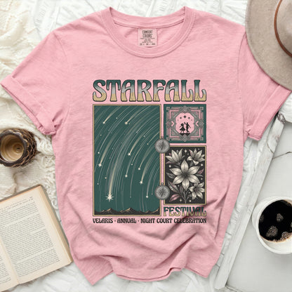 Pink t-shirt with "Starfall Festival" graphic of celestial scenes and flowers.