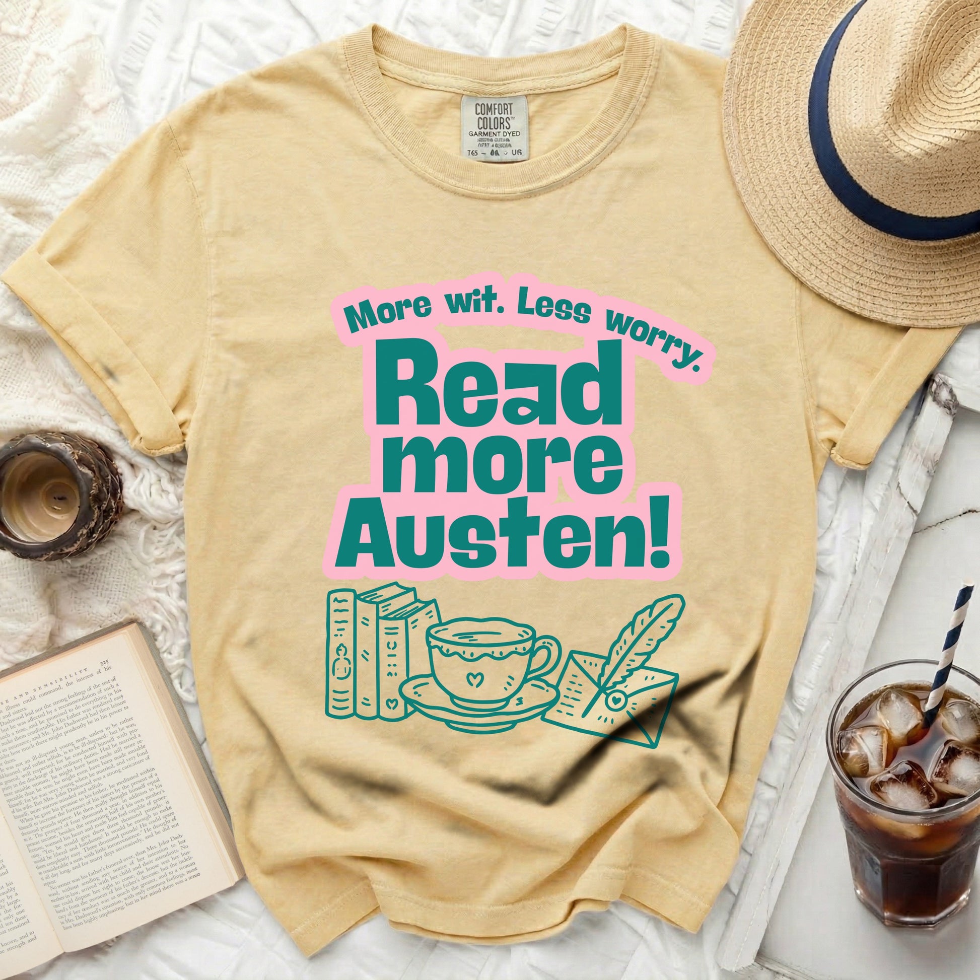 Yellow t-shirt with "Read more Austen!" text and literary graphics.