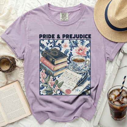 Pride & Prejudice t-shirt with literary illustration of books, cup of tea, and quill.