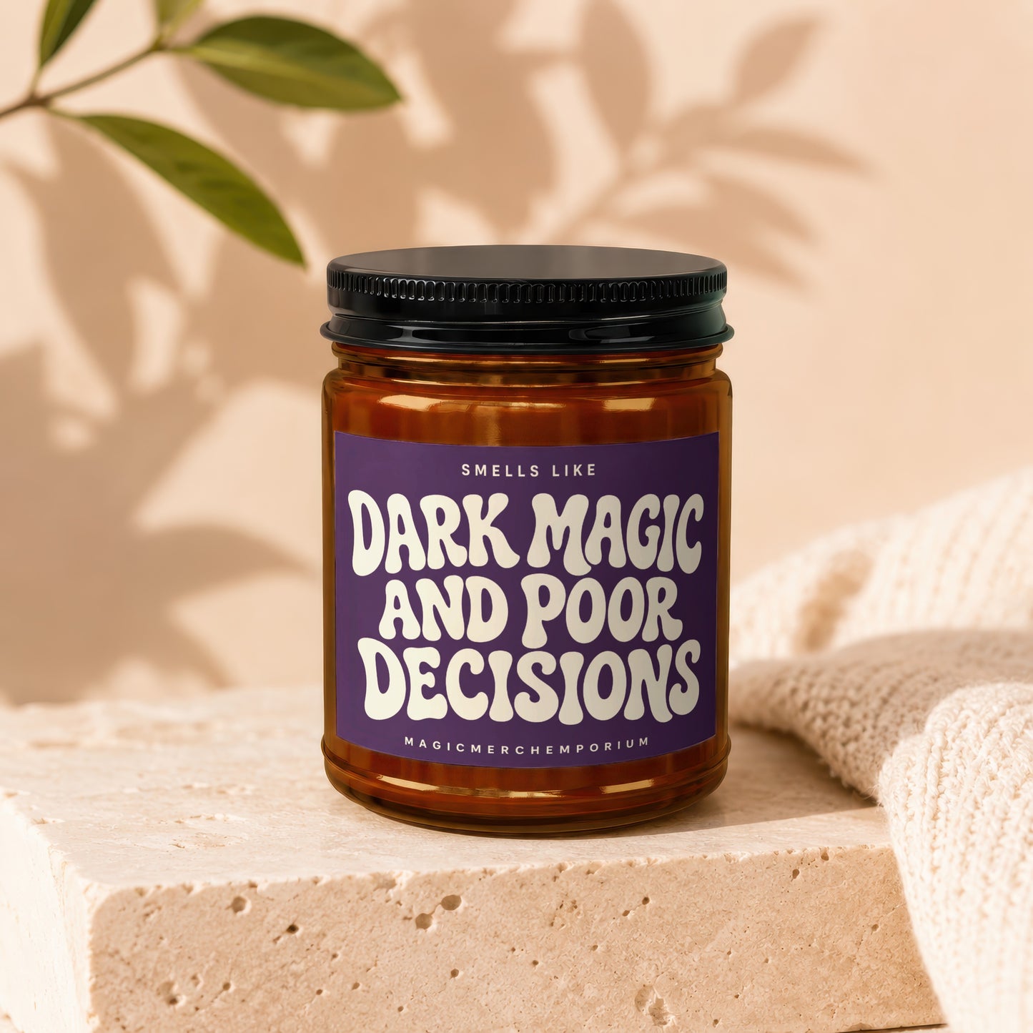Candle with label reading "Smells like Dark Magic and Poor Decisions."