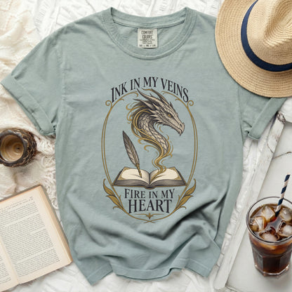 T-shirt with dragon, open book, quill, and text "Ink in my veins, Fire in my heart."