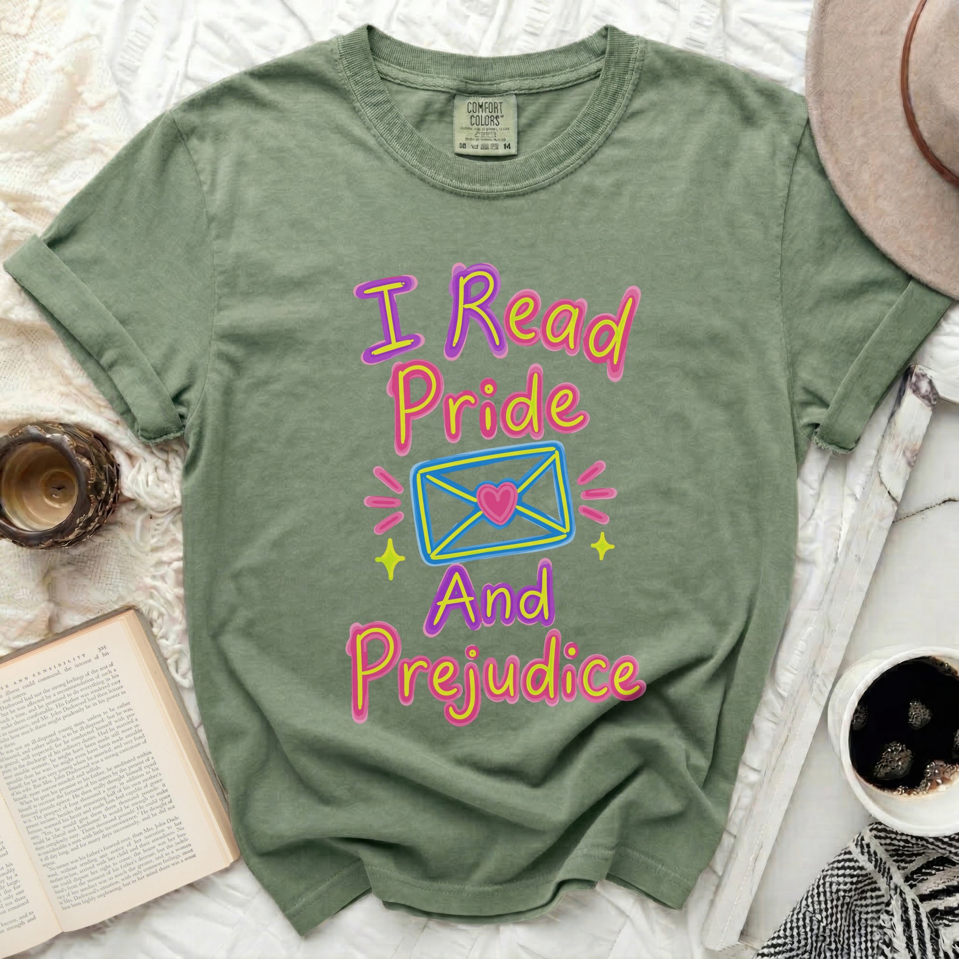 T-shirt with "I Read Pride And Prejudice" text and heart envelope graphic.