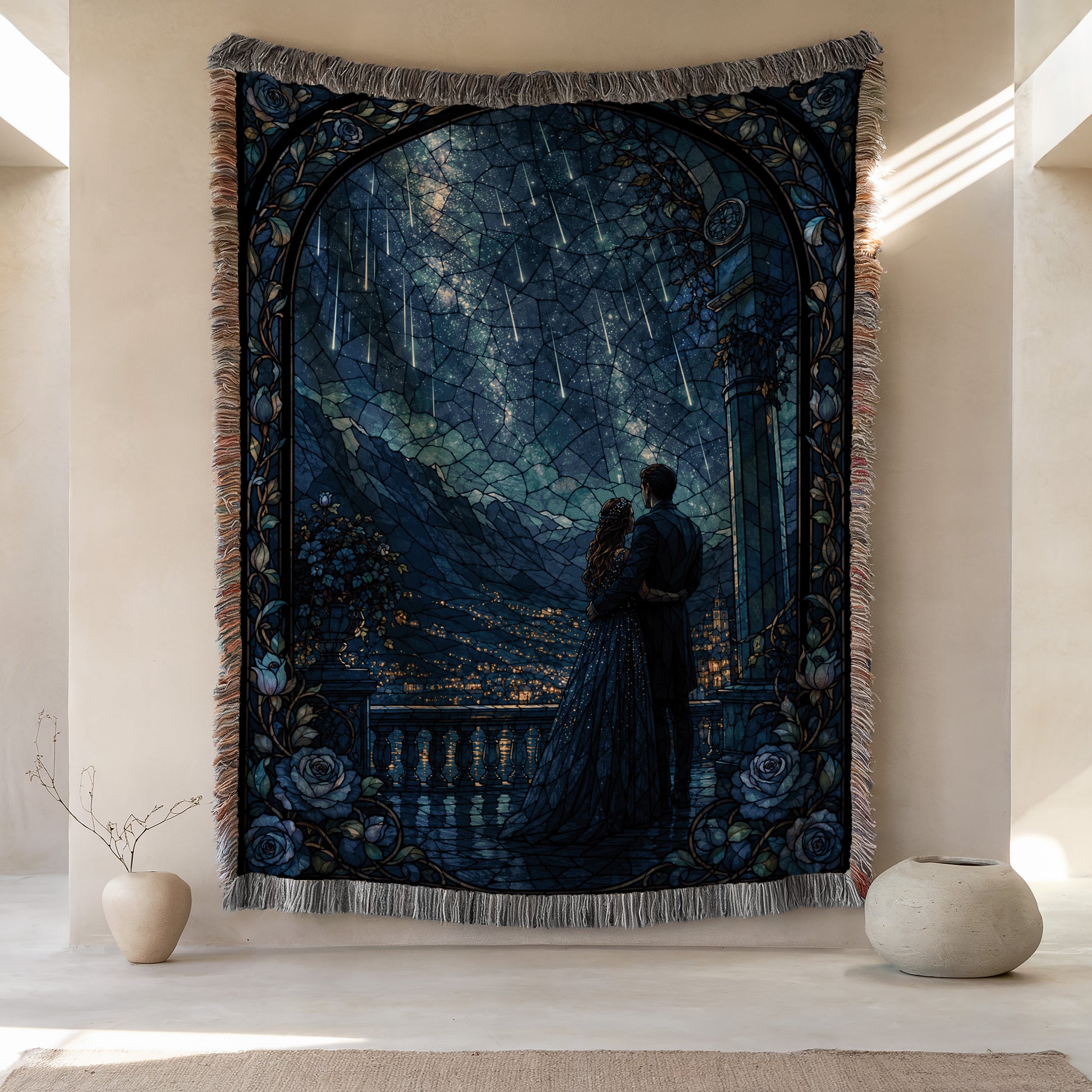 a large tapestry hanging on a wall, depicting a couple standing together under a starry night sky. The tapestry is framed by a decorative border and has a dark blue and black color scheme. There are two small vases placed on either side of the tapestry, and the overall scene appears to be a romantic and intimate moment captured in a piece of art.