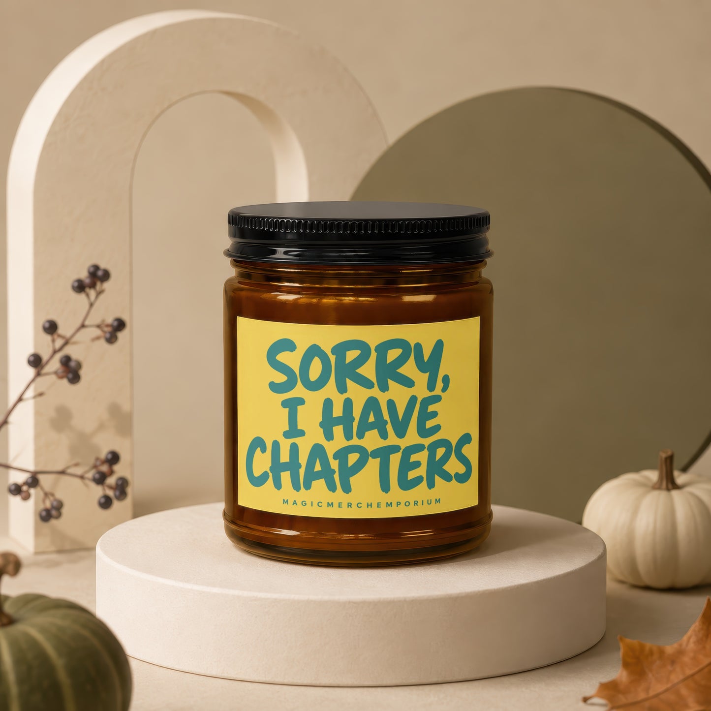 Amber jar candle with "Sorry, I Have Chapters" text on yellow label.