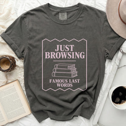 Gray t-shirt with "JUST BROWSING FAMOUS LAST WORDS" and stacked books graphic.