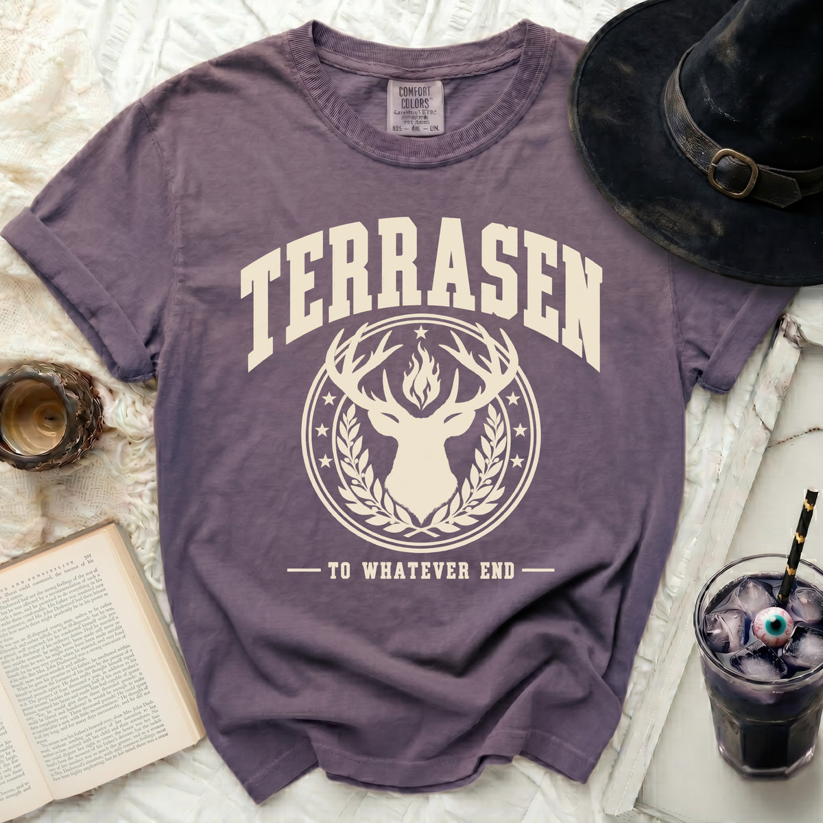 Purple t-shirt with "TERRASEN TO WHATEVER END" text and deer graphic.