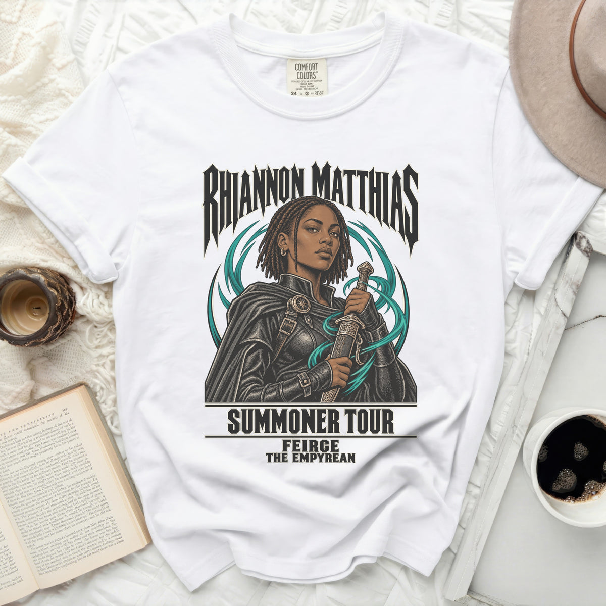 White t-shirt with "Rhiannon Matthias Summoner Tour Feirge The Empyrean" graphic.