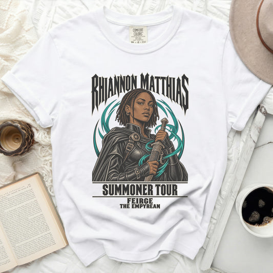 White t-shirt with "Rhiannon Matthias Summoner Tour Feirge The Empyrean" graphic.