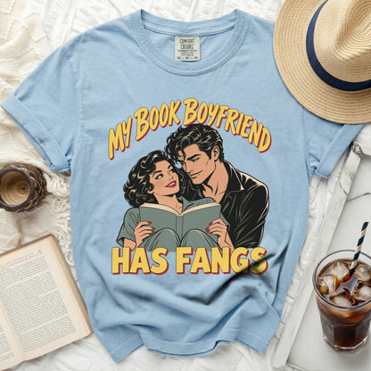 Light blue t-shirt with "My Book Boyfriend Has Fangs" comic-style graphic.