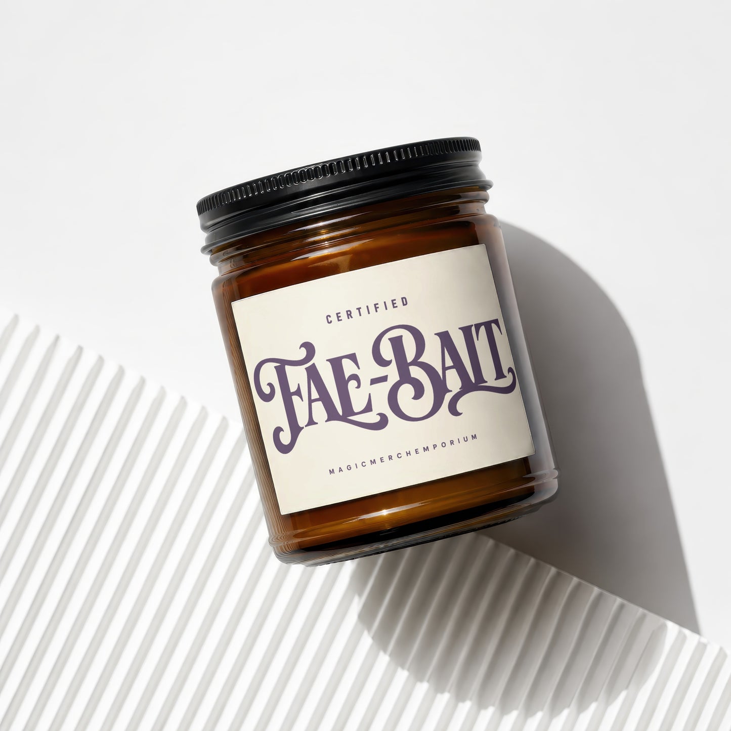 Brown glass candle with label reading "CERTIFIED Fae-Bait MAGIC MERCH]EMPORIUM".