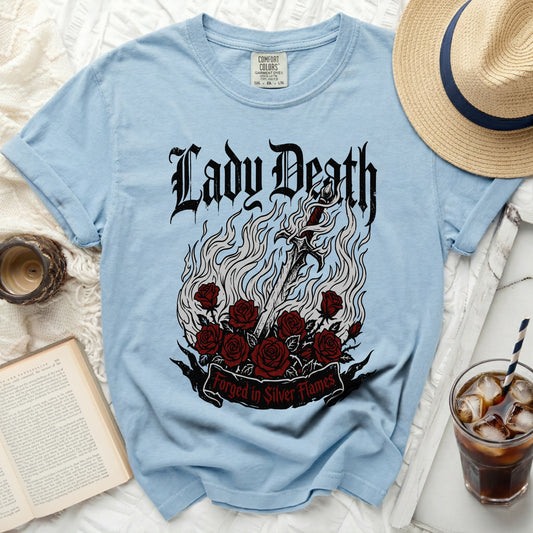 Light blue t-shirt with "Lady Death" and a flaming sword over roses.