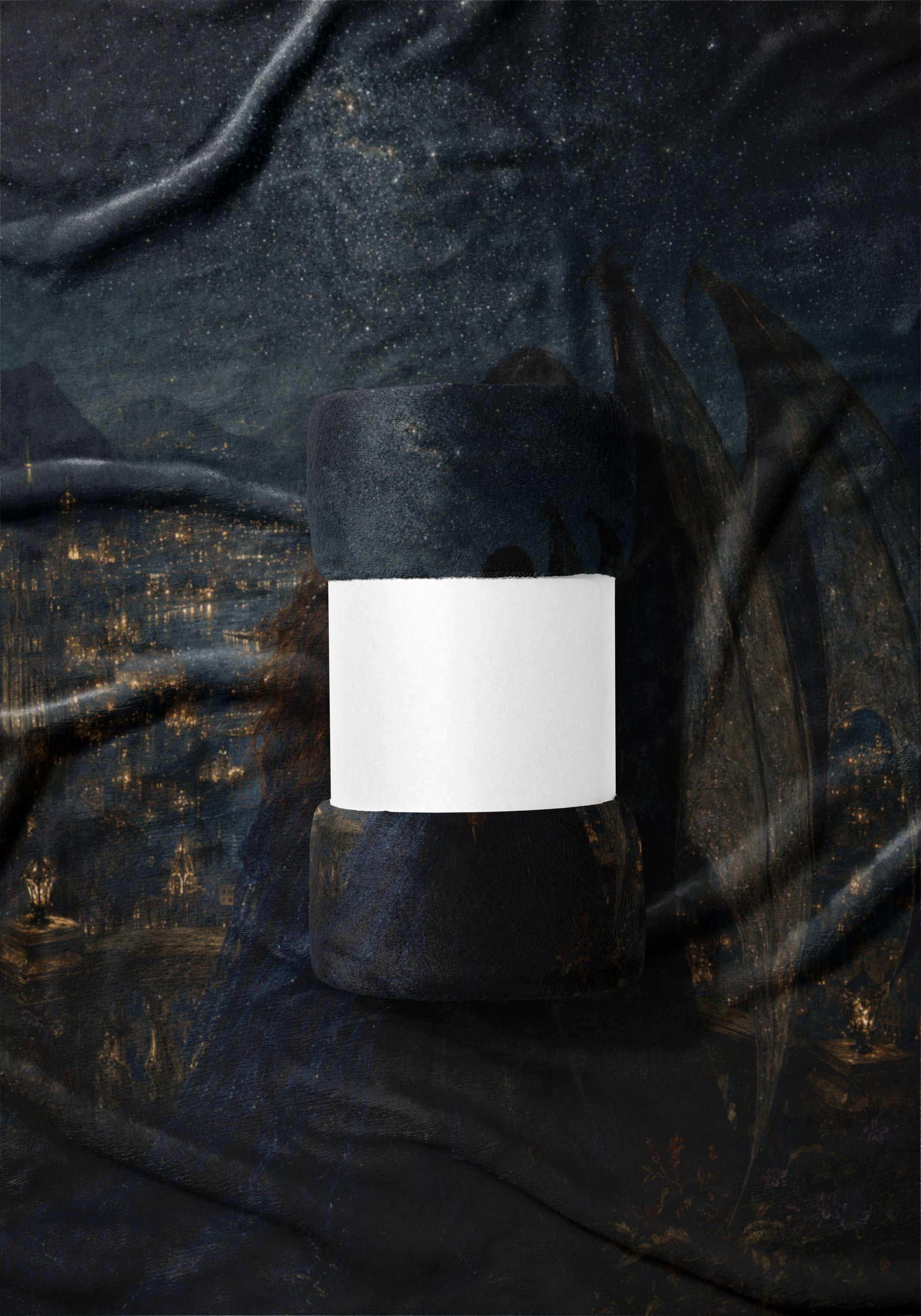 Rolled blanket with star and city night print, white band for text.