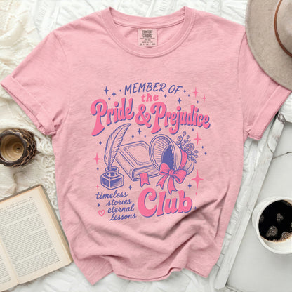 Pink Comfort Colors t-shirt with "Member of the Pride & Prejudice Club" graphic.