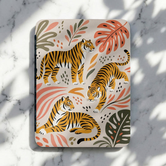 Three tigers in different poses on a cream background with coral and green botanical elements.