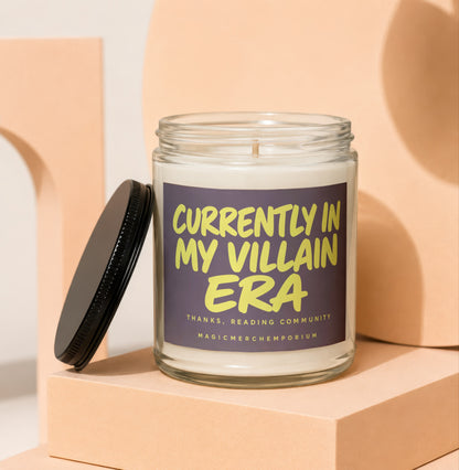 Glass candle with black lid, labeled "Currently In My Villain Era."