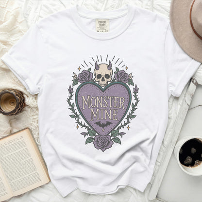 White t-shirt with "Monster Mine" heart graphic and gothic elements.