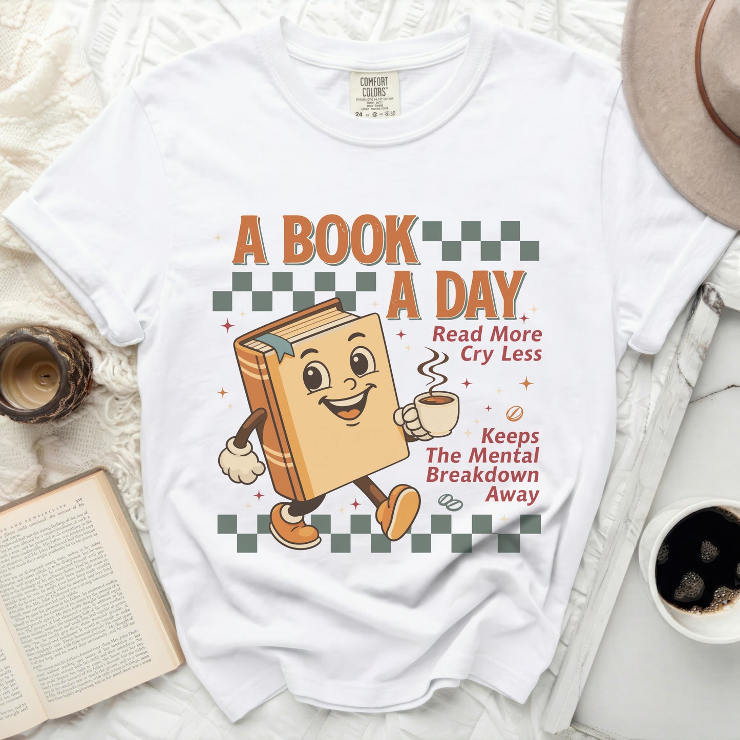A book graphic with text "A BOOK A DAY Read More Cry Less Keeps The Mental Breakdown Away".