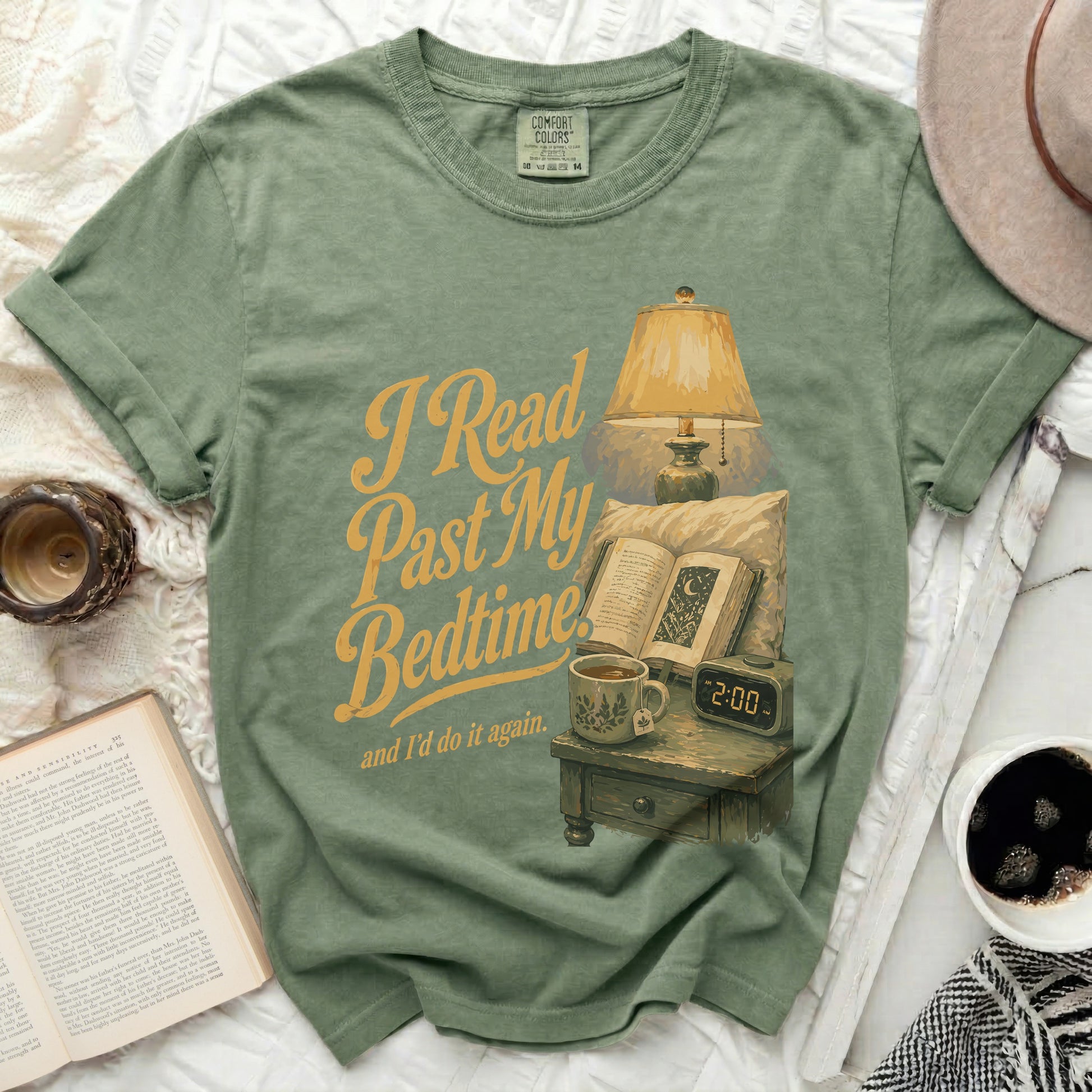 T-shirt with "I Read Past My Bedtime and I'd do it again" text over illustration.