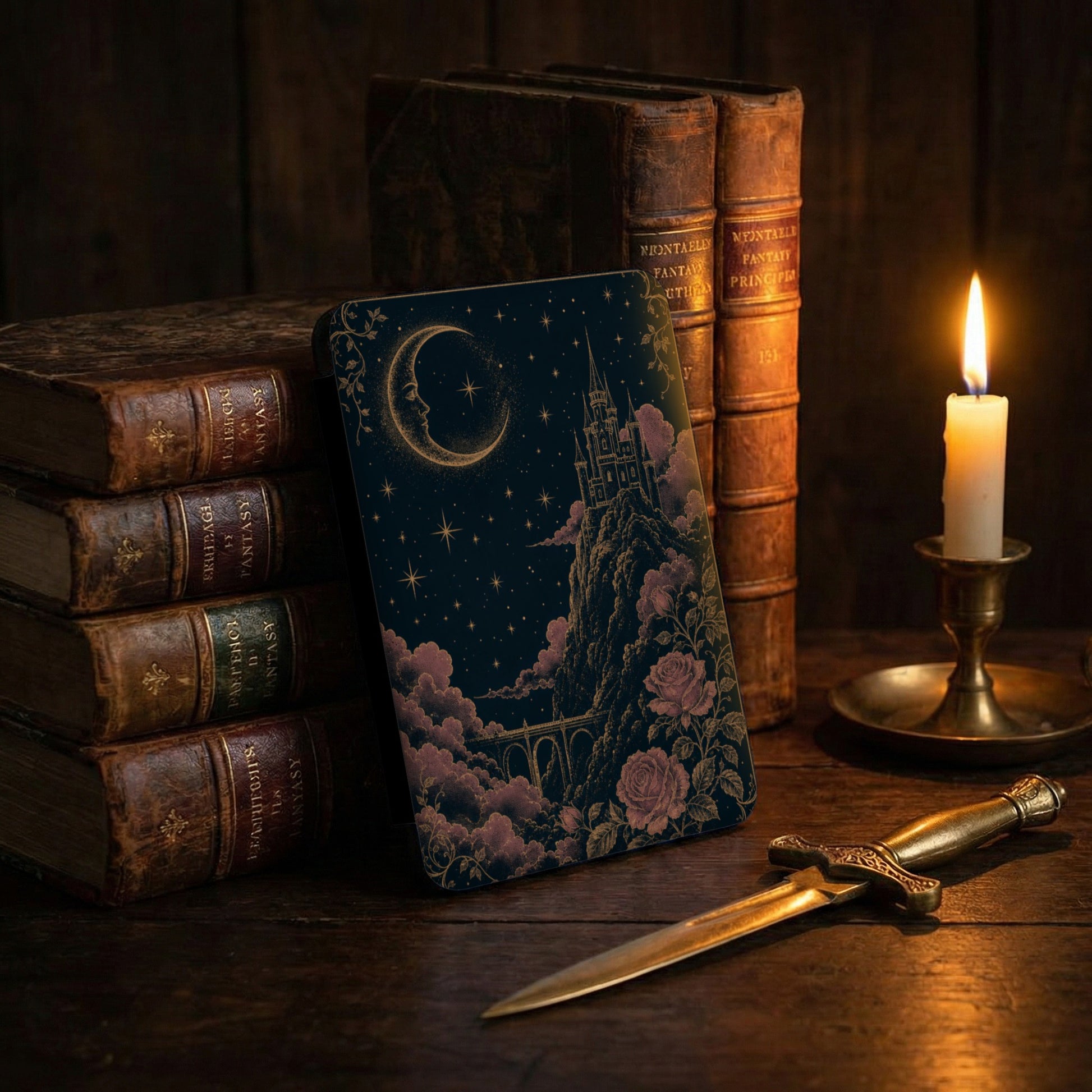 Ornate journal featuring a crescent moon, castle, and roses against a starry night sky.