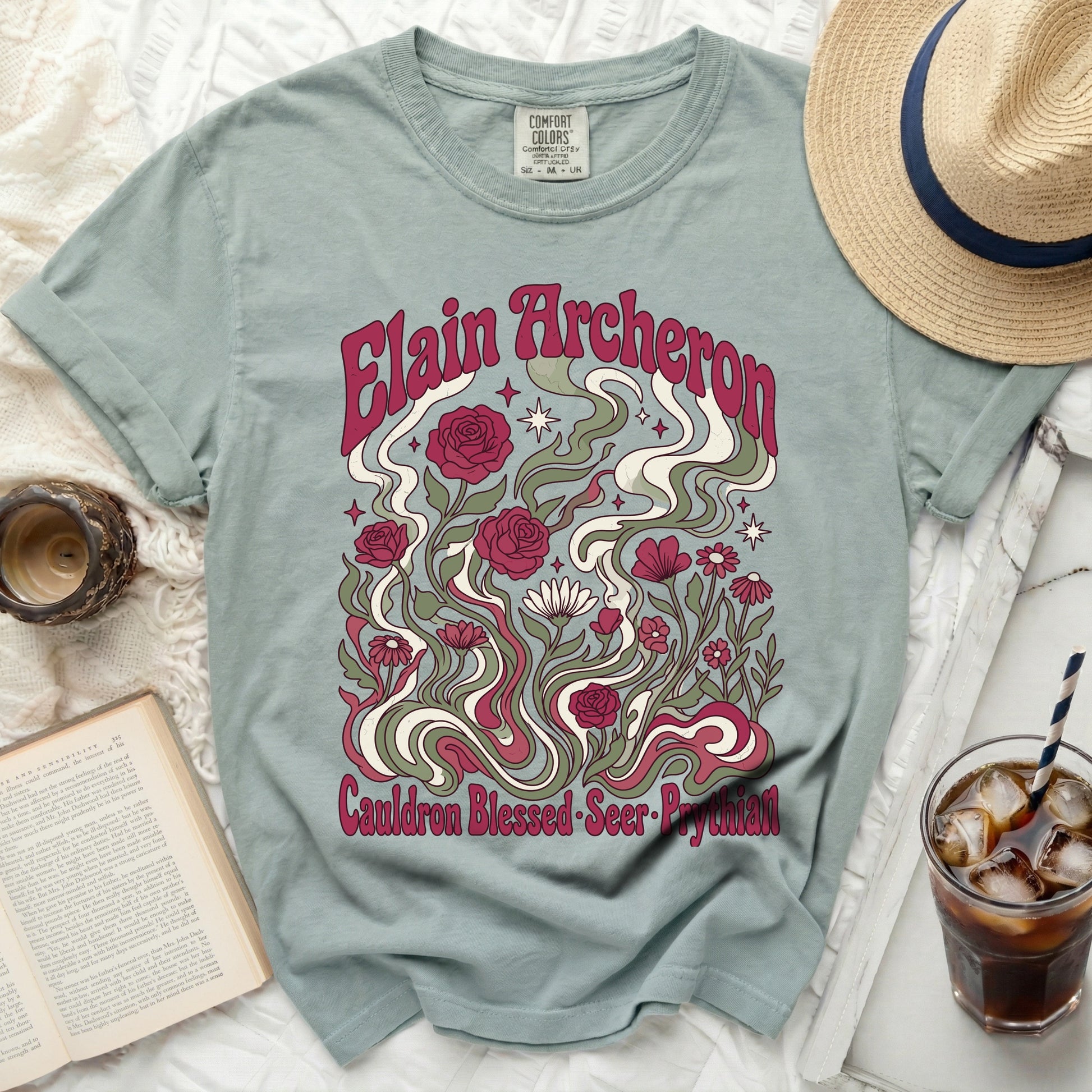 Elain Archeron graphic t-shirt with floral and wavy design.