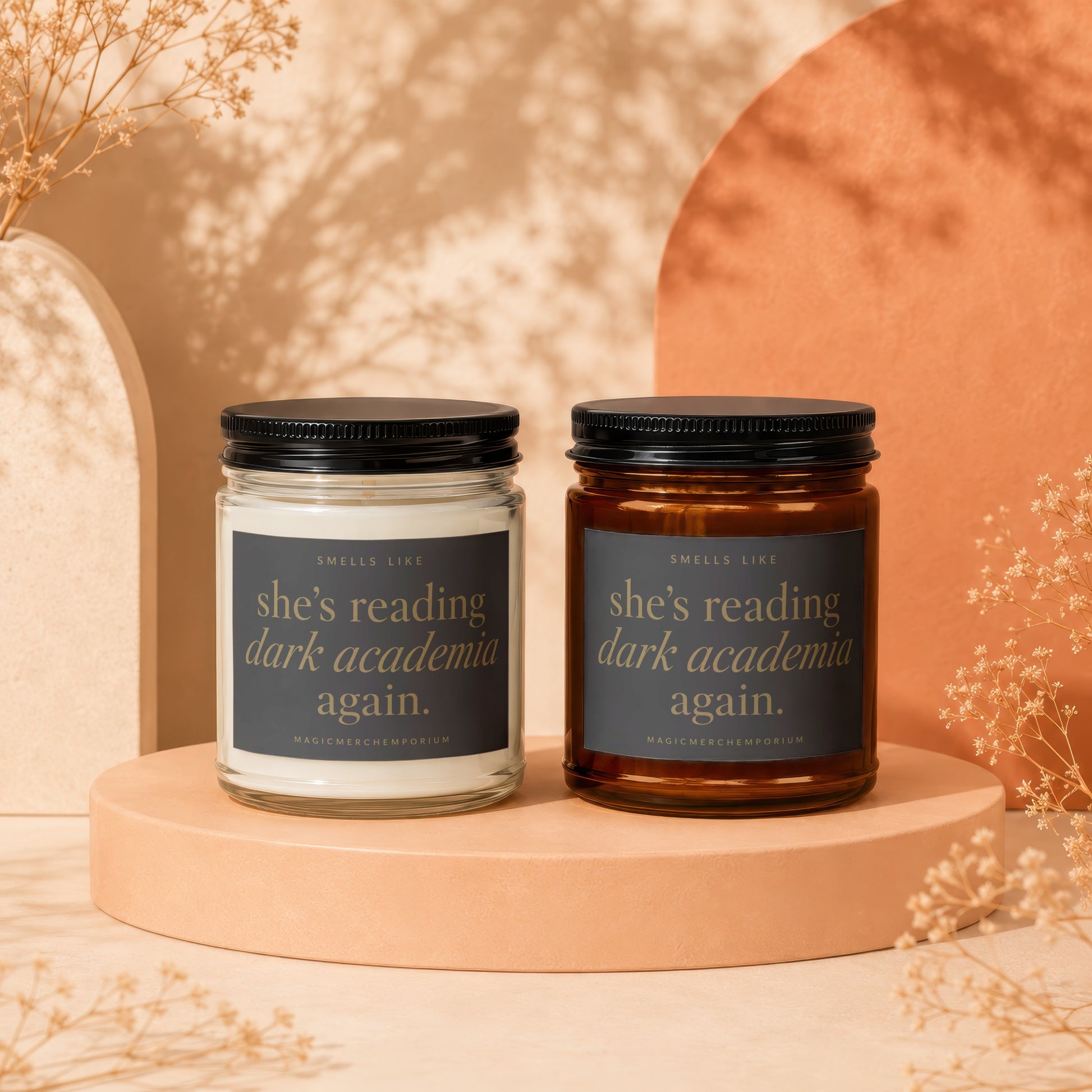 Two candles with "she's reading dark academia again" text.