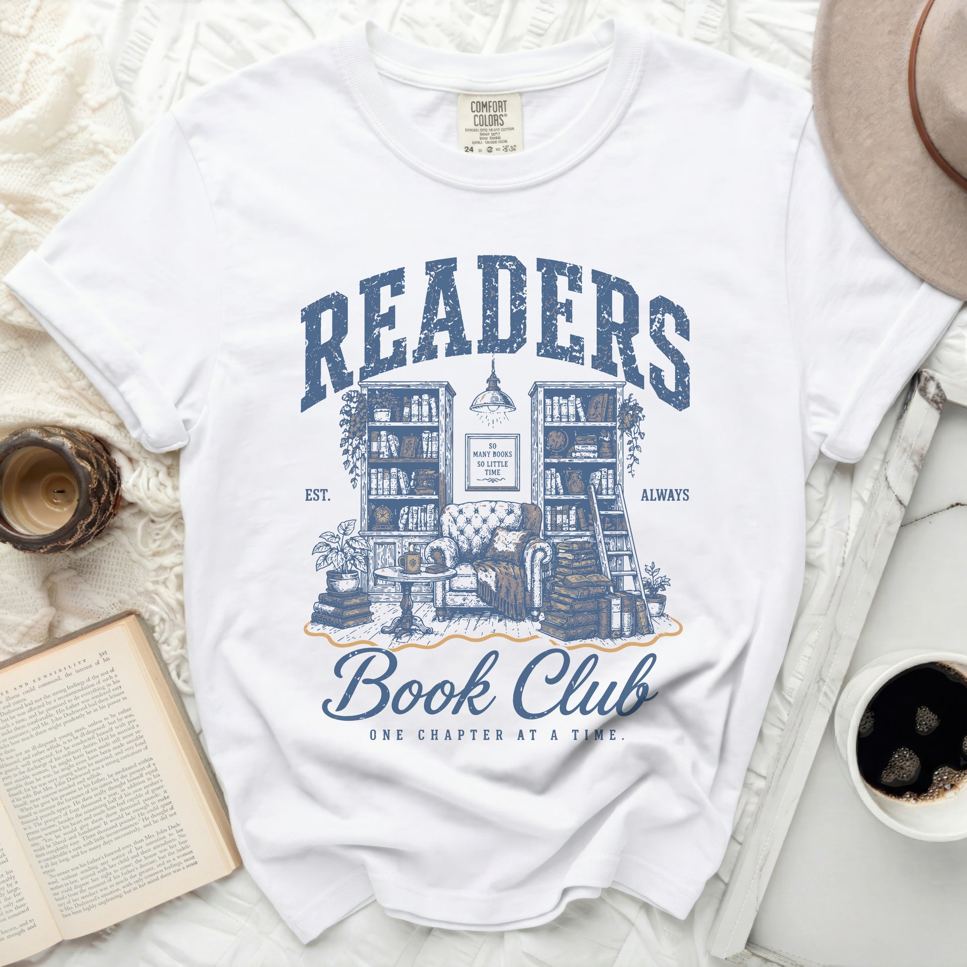 White t-shirt with "Readers Book Club" graphic and books.