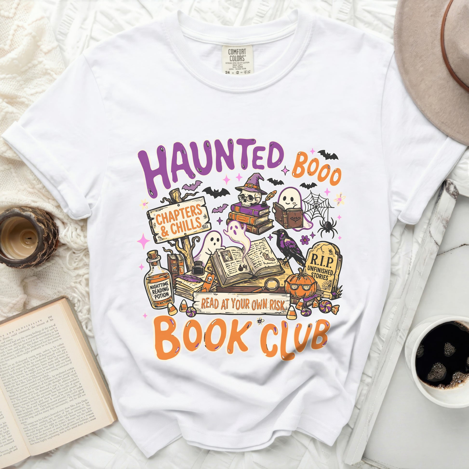 White t-shirt with "Haunted Book Club" Halloween graphic.