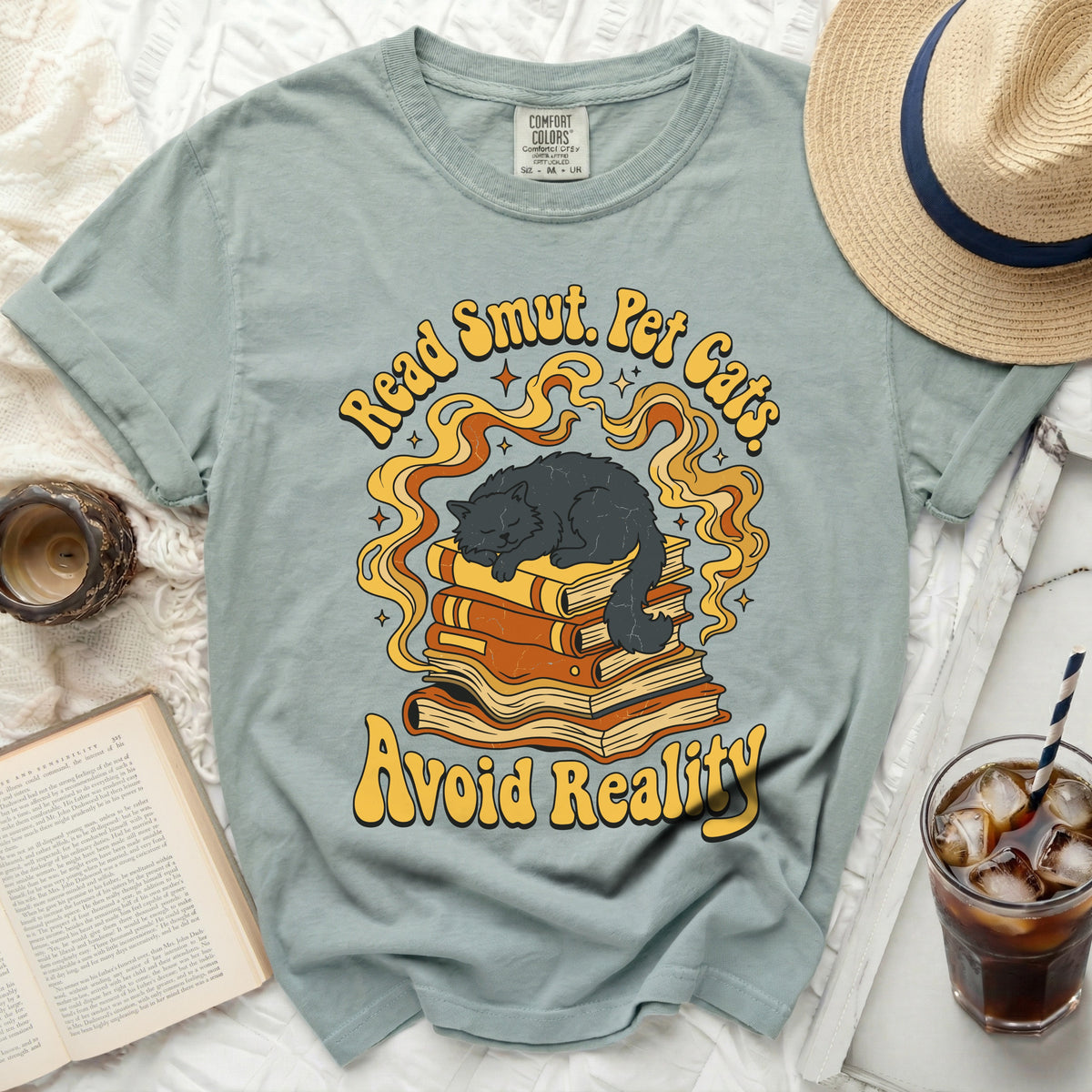 Read Smut. Pet Cats. Avoid Reality graphic on a t-shirt.