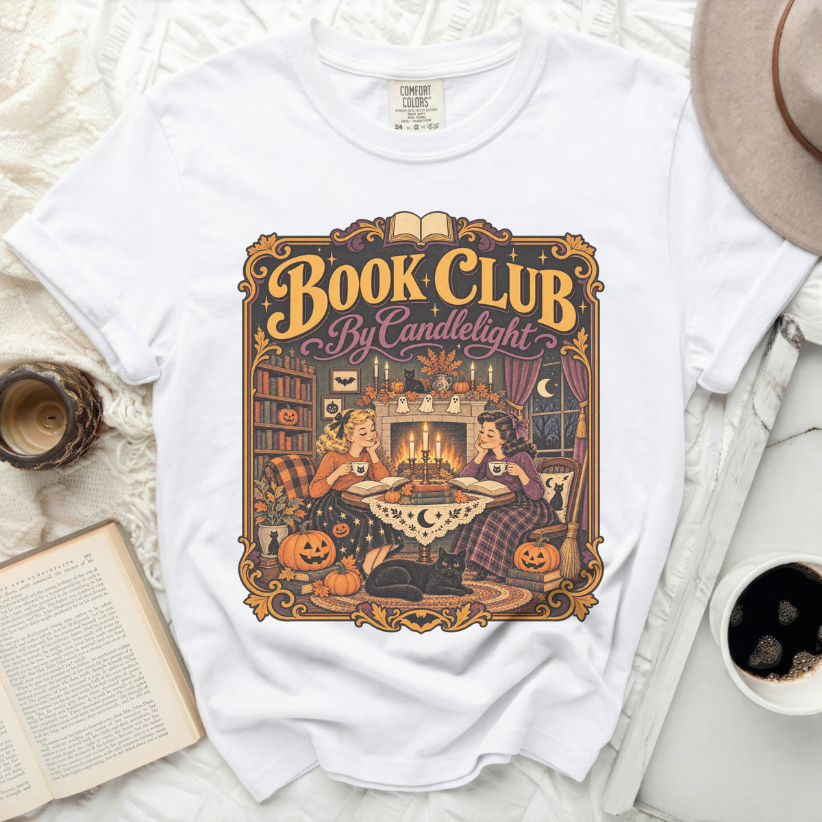 White t-shirt with "Book Club By Candlelight" Halloween graphic.
