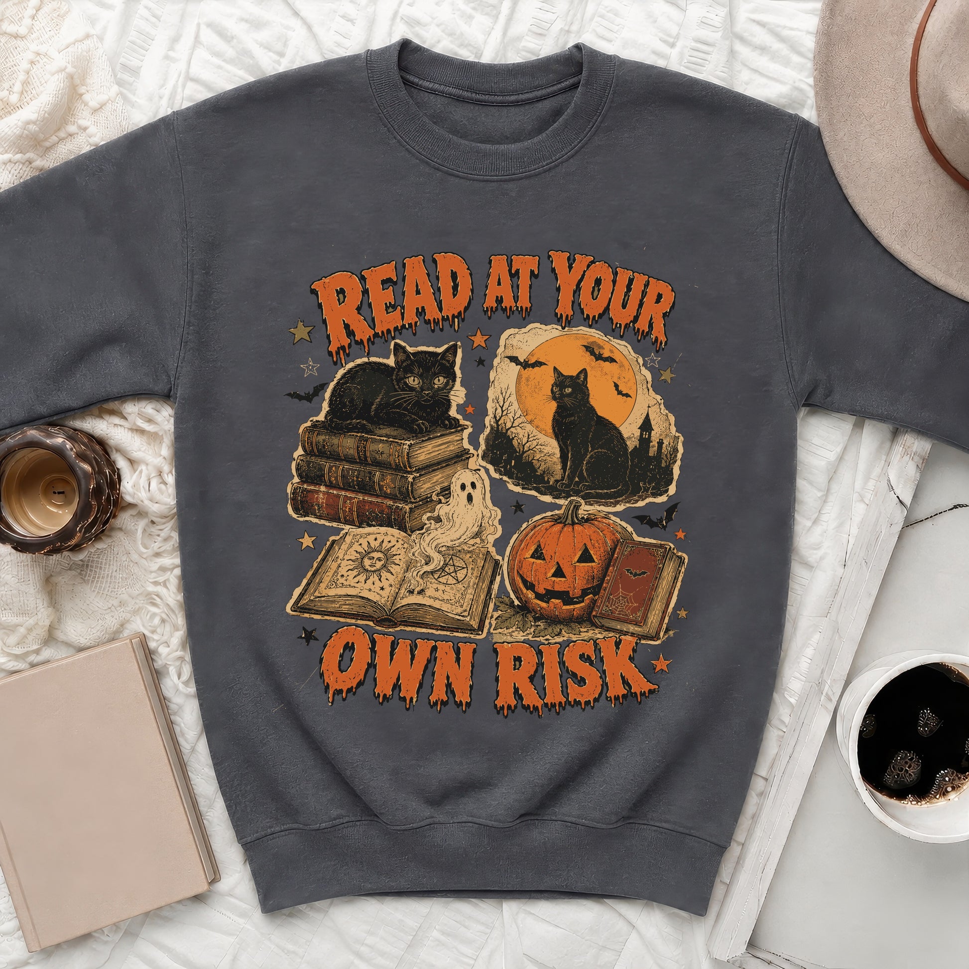 Graphic tee with text "Read at Your Own Risk" and Halloween imagery.