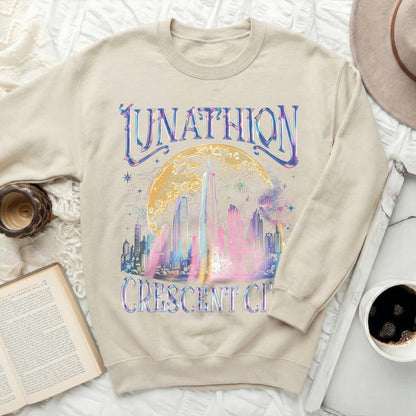 Light cream crewneck sweatshirt with "LUNATHION CRESCENT CITY" text and city skyline.