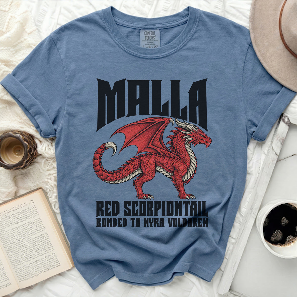Blue t-shirt with red dragon design and text: MALLA, RED SCORPIONTAIL, BONDED TO NYRA VOLDAREN.