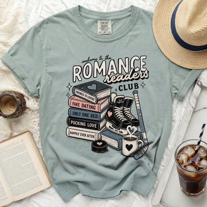 Romance Readers Club graphic tee with books, skates, hockey stick, and text.