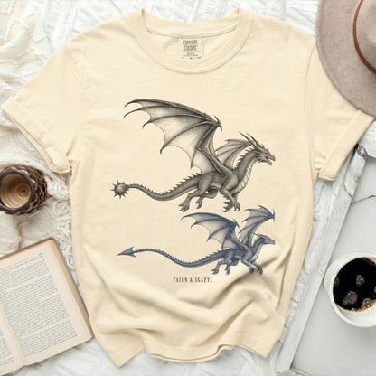 Cream t-shirt with two dragon illustrations and "TAIRN & SGAEYL" text.