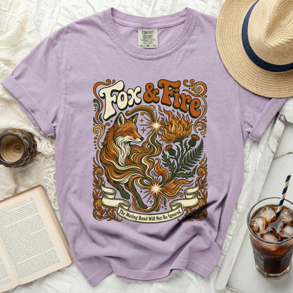 Purple t-shirt with "Fox & Fire" graphic and text "The Mating Bond Will Not Be Ignored."