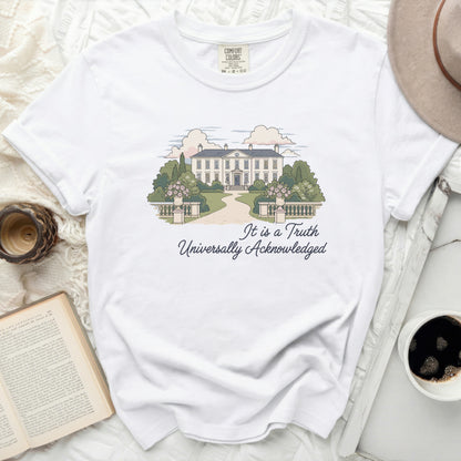 White t-shirt with illustration of a manor house and text "It is a Truth Universally Acknowledged".