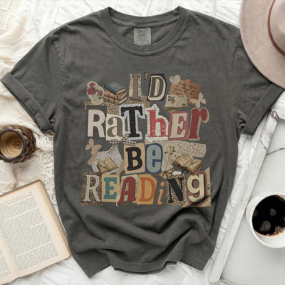 Grey t-shirt with "I'd Rather Be Reading" collage design.