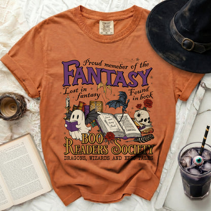 Orange t-shirt with "Fantasy Boo Readers Society" text and spooky illustrations.