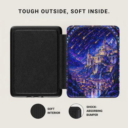 An open Kindle case with a textured black interior on the left and a stained-glass castle design on the right.