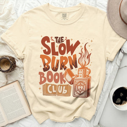 The Slow Burn Book Club t-shirt with graphic of a lighter, mug, and book.