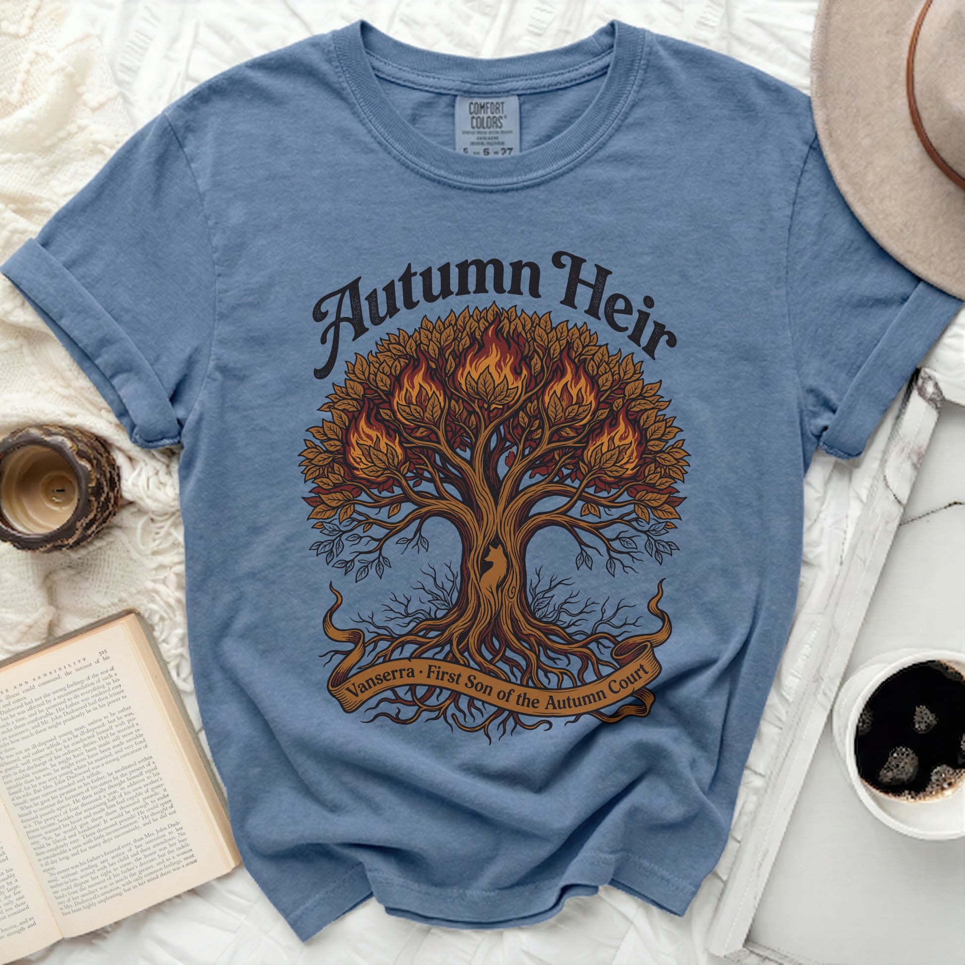 Blue t-shirt with "Autumn Heir" and "Vanserra First Son of the Autumn Court" text.