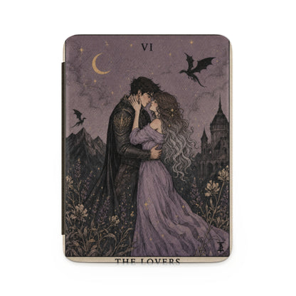 Tarot card "The Lovers" with a couple embracing, dragons, moon, and castle.