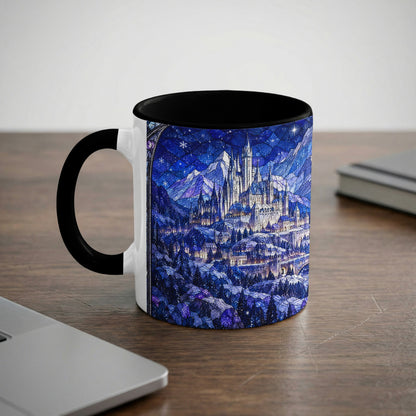 Black and white ceramic mug featuring a blue winter castle stained glass graphic on a wooden desk.