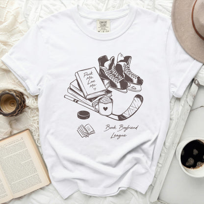 White t-shirt with "Book Boyfriend League" text and hockey skates.